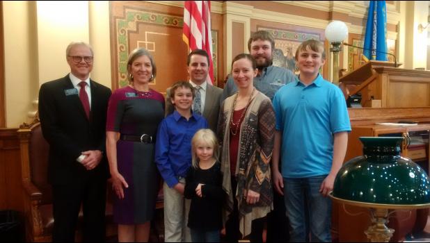 Pictured in photo (L-R): Representative Mike Weisgram, Senator Mary Duvall, Justin Neuharth, Representative Will Mortenson, Kaydee Neuharth, Crystal Neuharth, Levi Neuharth, and Jonathon Neuharth. Courtesy Photo