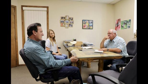 Governor Rhoden, Josie Harms and Don Ravellette sit down to dicuss concerns with the newspaper industry has with the United States Postal Service. Courtesy Photo
