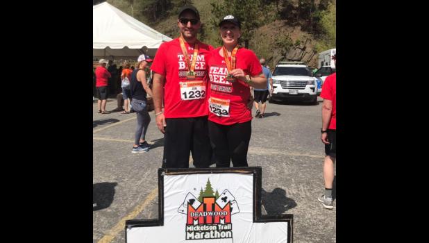 Jon and Katrina Collins … all smiles after finishing the Deadwood Mickelson Trail half marathon. Courtesy photo