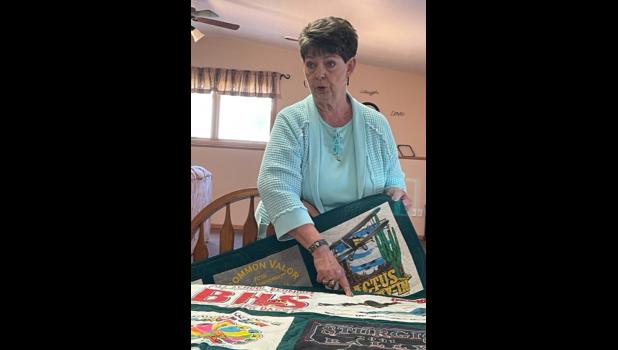 Bert Lewton displayed a t-shirt quilt made for her husband at Town and Country CFEL’s recent monthly meeting.