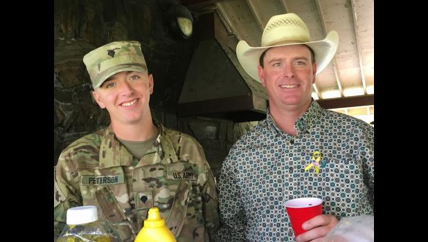 Parker Peterson and Paul (dad) Peterson at family gathering following the deployment ceremony in Rapid City. Photo courtesy Joey Peterson
