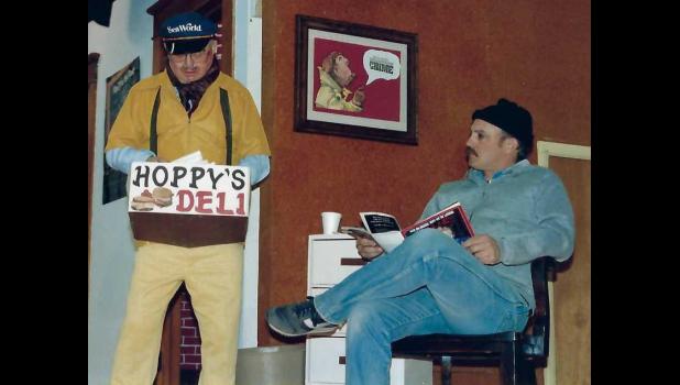 Hoppy Hopkins delivers sandwiches in the 1991 play, “Squad Room.” It was hard to keep his tray filled with sandwiches. The “pickpocket” (Glen Hovland) awaits his turn to talk to the cops. Glen also had some memorable roles, especially as the elevator operator in “Hotel LaRoach.” Courtesy Photo