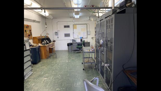 Here is a rare look inside the operational half of this enigmatic VOR installation, thanks to the FAA. The other half, divided by a firewall, is where a generator used to be but is now vacant. Housed in this, thus far, indispensable secure sight are the low-power transmitters and other equipment necessary to operate the transmitters.