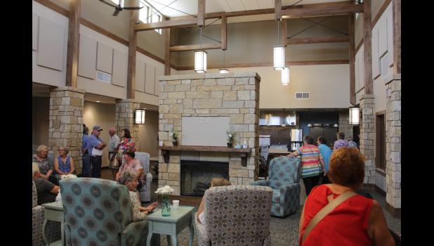 As you walk into the front door of the Scotchman Living Center you see big open spaces and a very beautiful setting. Visitors gathered there for the tour and many relaxed and enjoyed conversation.