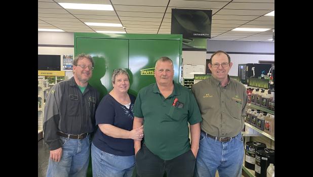 Neal jones, Bobbi Woitte, Joe Woitte, and Bill Manke were four employees that Started with Baye and Sons and have worked together through all three dealership owners. Courtesy Photo