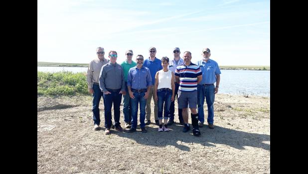Shown above left to right: Derek Nisly, RC Scull, Joe Hockett, John Schmidt, Lander Legge, Paula Vachal, Seth Haigh, Jason Jungwirth and Roy Boschee. Jenny Leibel