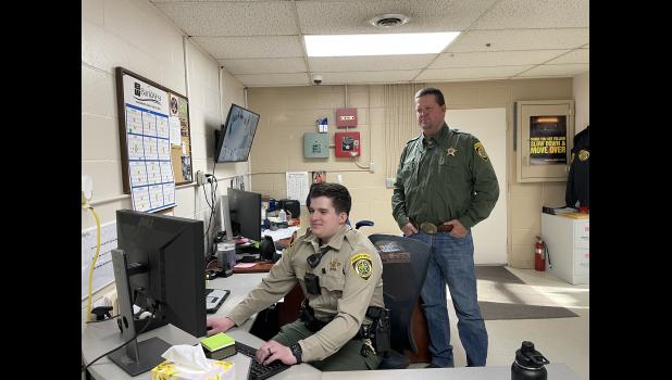 Jackson County Sheriff Tucker Amiotte with newly appointed JCSO Deputy Chauncey Hauptmann. Photo courtesy of Elizabeth Meighen