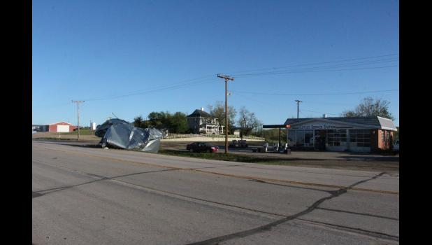 Saturday evening very high wind speeds picked up this grain bin from about a 1/4 mile away and sent it east along highway 14 in front of Coyle’s Standard Station.