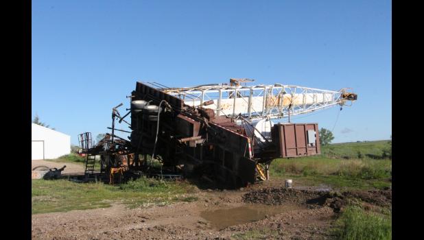 The drilling rig at the geothermal well by the golf course north of Philip blew over in Saturday’s storm.