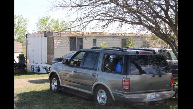 This trailer home lost the entire roof and the vehicle took on heavy window lose in the storm Saturday.