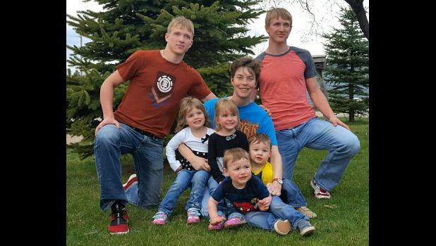 Jill Archibald with the 3 sets of twins she has cared for in the past 20 years. left to right, Cole and Cody Buer, Baelyn and Tegan Senn, Jacob and Liam Kruger. There is no end in sight when it comes to Jill and taking care of Bison’s babies.