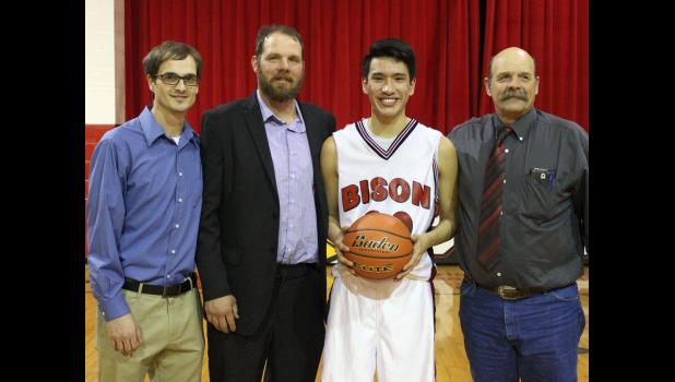 Josh McKinstry pictured with his coaches - Bailey Ellison, Nevada Ellison, and Carlie Ellison.