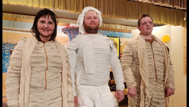 “How I Met Your Mummy”: Reporter Penny Dreadful, aka Faye Piroutek; Real Mummy Yo-Wut-Sup, aka Jade Berry; Actor Ralph, aka Paul Piroutek Courtesy Photo