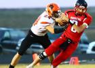 Philip’s Lane Kroetch performs a solo tackle against this Lyman Raider ball carrier. Photo by Barb Hockenbary