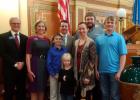 Pictured in photo (L-R): Representative Mike Weisgram, Senator Mary Duvall, Justin Neuharth, Representative Will Mortenson, Kaydee Neuharth, Crystal Neuharth, Levi Neuharth, and Jonathon Neuharth. Courtesy Photo