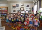 On July 7, the summer reading program kids got to pick out their own books for all the reading goals they set. Courtesy photo of Sara Buls