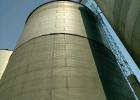 The grain level in this 100,000 bushel bin is now a downward funnel with that funnel’s outer edge just a few feet above the crinkle line. This is to keep pressure equal on the weakened area until experts can determine how much of the bin has to be repaired or replaced.