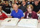 Alvin and Ruby Pearson with two cakes commemorating Alvin’s 45 years at Scotchman Industries, Inc.
