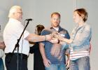 Kelly Miller, Black Hills Community Economic Development president, presented the organization’s Small Business Startup of the Year award to Colton and Erin Fitzgerald, owners/operators of Philip Hardware.