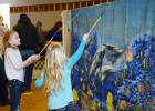 Gone Fishing ... These girls have cast their poles and are waiting patiently for a bite on the line, at Family Fun Festival held Sunday, February 11, 2018. Notice all the sea life swimming by? Looks like a few great fish stories!