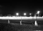 Vehicles surrounded the Philip football field on Thursday, April 16 at 8:20 p.m. to “Be The Light” to show support for the graduating class of 2020, whose final high school year was abruptly ended due to COVID-19. The campaign also highlights support for healthcare workers fighting COVID-19 nationwide. Inset: A few Scottie seniors walked onto the field during the lighting of the football field. “Pomp and Circumstance”, known as the graduation song, could be heard playing from a couple vehicles. Chelsea Tobin