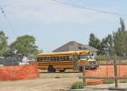 The eastern portion of the playground is cordoned off for parking.