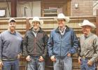 Scott Vance, far left, and his dad, Gary Vance, far right, announced the sale of Faith Livestock Commission Co. at Monday’s sale, May 15. The next generation to operate the sale barn is Mason Dietterle, middle left, and Dace Harper, middle right, both of the Faith area. 