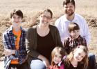 The Switzer family has moved to Midland. Pastor Walter is the new Open Bible Church pastor. Shown in back is Pastor Walter. In the middle, from left, are Caleb (12), Darcey and Seth (9). Front: Zoey (4) and Abigail (7).