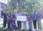 Modern Woodmen hosted a Walking Taco event in May to support Kaden Nieman and his family. The event raised over $4,000. Don Haynes presented a check to Nieman on Tuesday, June 25. Pictured: Back row (l to r): Mindy Green, Krista O’Dea, Cindy Pfeifle, Jennifer Henrie, Don Haynes, Kaden Nieman, Brett Nieman, Tara Mitchell and Jeremy Schultes. Front row (kneeling): Denise Buchholz. Chelsea Tobin