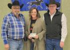 Out of State Leading Money Earner, Three Year Old, Hasta Be Tickled, Owner John Johnson, Trainer Bob Johnson, Sponsor Southwest Grain. Pictured Bob and Shilo Johnson and Mike Lemburg President SDQHRA.