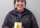 Mesa Krautschun pictured with her 1st Place Individual in Veterinary Science plaque.