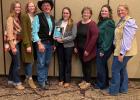 Kelly Froehlich, assistant professor and SDSU Extension Sheep and Goat Specialist, at center, presents the Master Lamb Producer Award to the Anderson family, owners of Darling Creek Ranch, LLC. Anderson family members pictured, from left, Danci, Danika, Dan, Sharon, Dantae and Danessa. Photo courtesy SDSU Extension Jones/Mellette County 4-H