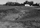 Patrick Solon, public work department, expressed safety concerns due to steep ditches with sharp slopes and rocky flats. Solon believes a joint effort between the city of Kadoka and the Kadoka Area Schools to address concerns will produce the best results to enhance the appearance of the gymnasium and ensure the safety of city and school employees and students. Photo courtesy of Elizabeth “Liz” Meighen